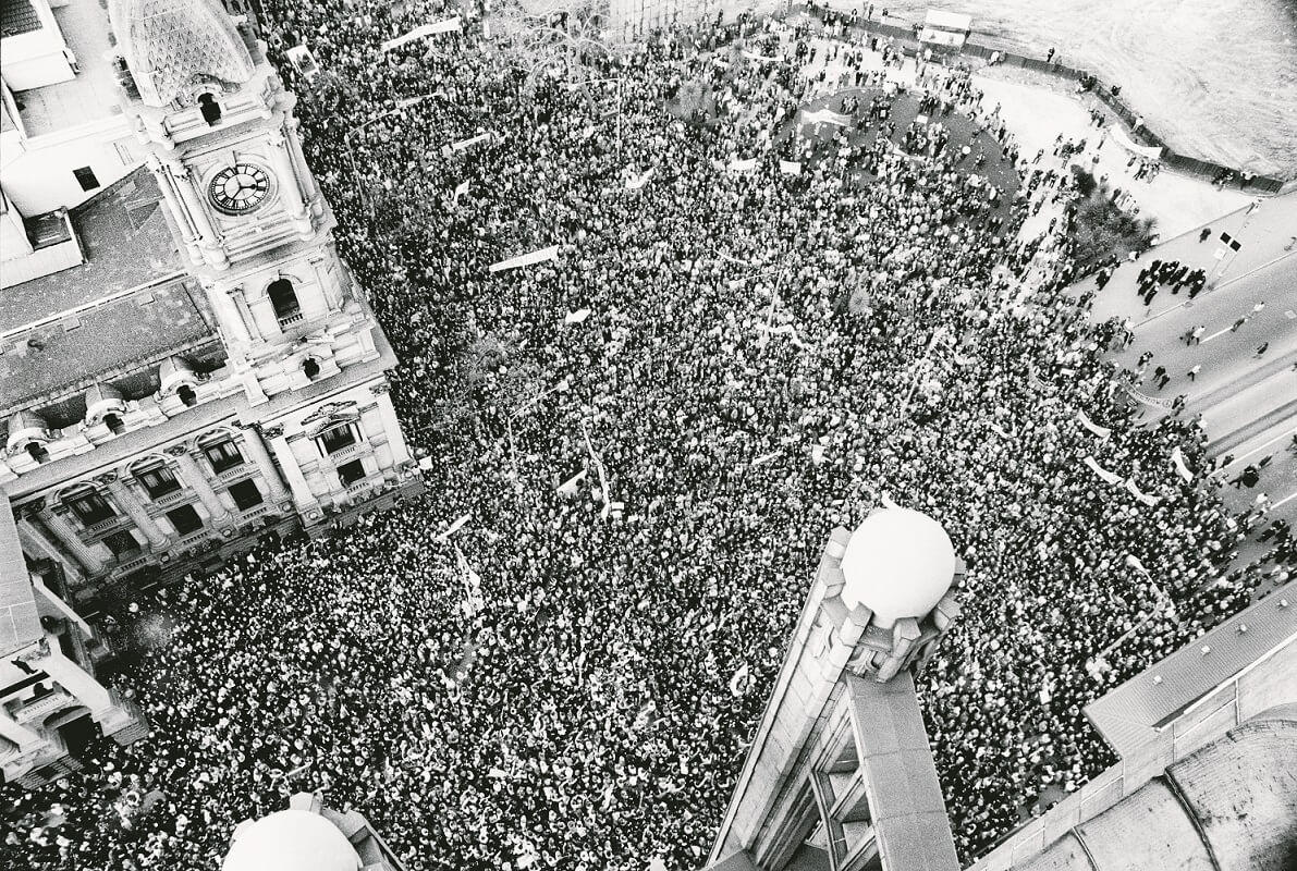 Photograph of a large crowd in Melbourne captured from the Manchester Unity Building